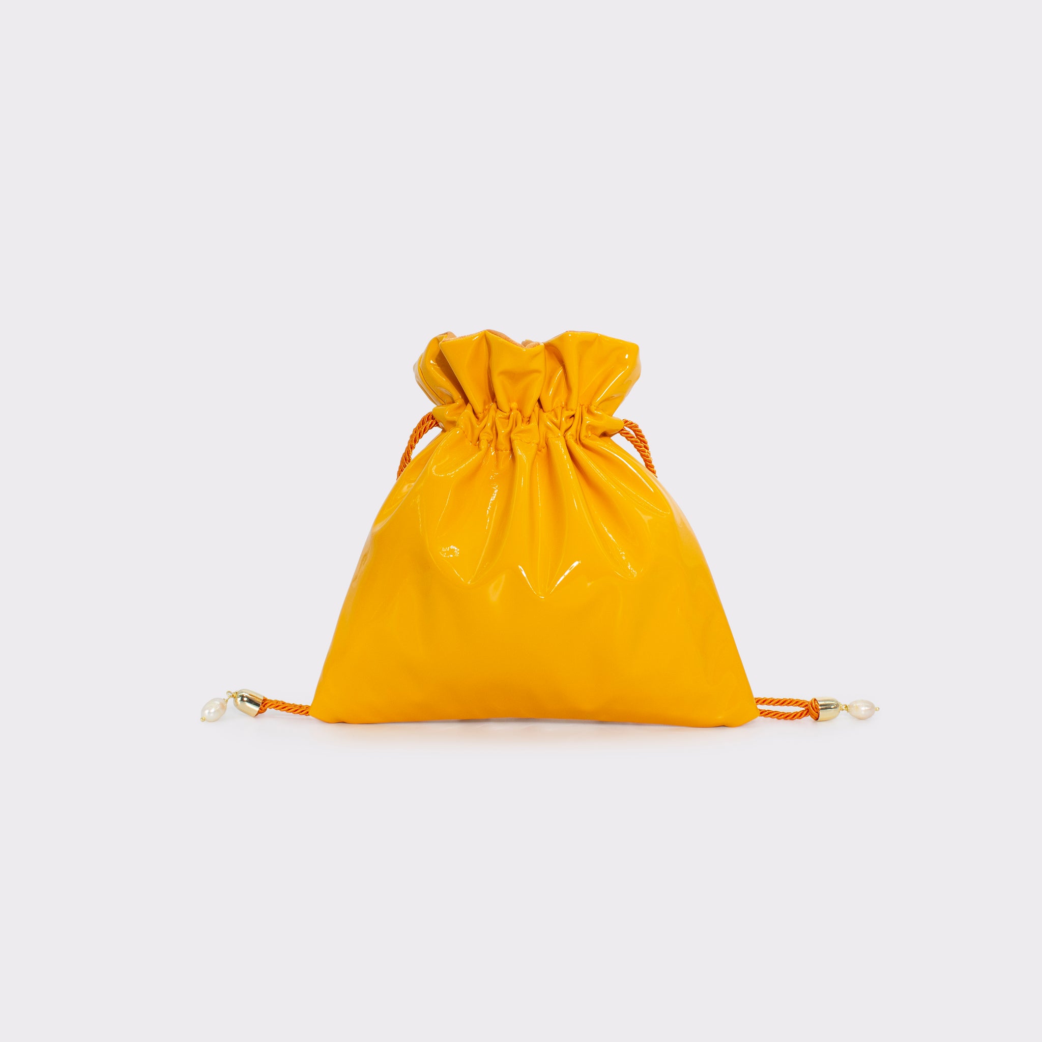 Glossy mini bag in colorazione mango